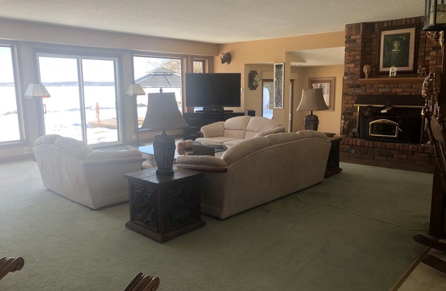 Lakefront with pool and hot tub