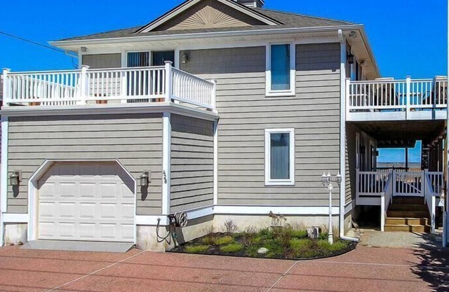 Large 5 bedroom Bayfront home with 180 degree unobscured views of the back bay