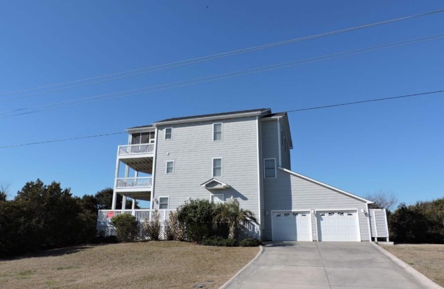 Large oceanside home w/elevator located at the Point in Emerald Isle!