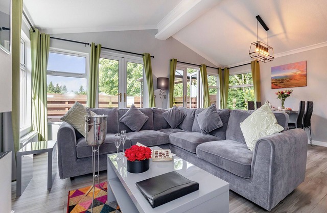 Large superior one-bedroom lodge with hot tub for two adults.