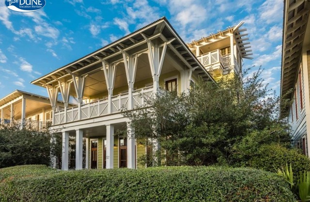 Located right on 30A, '57 Western Lake Drive' is a 6BR/6.5BA Home + Carriage House