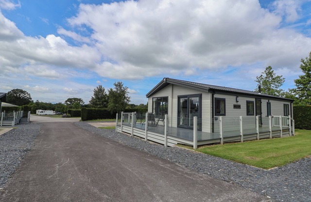 LODGE 3, pet friendly, country holiday cottage, with pool in St Asaph