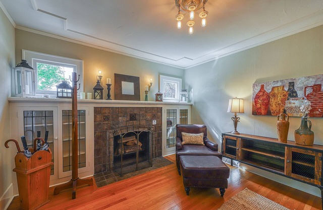 Lovely home adjacent to the lake with large yard, gas grill, and game room