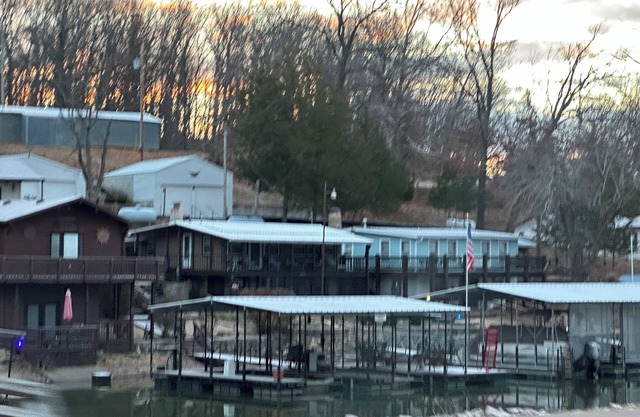 Lovely home on a quiet lake front property with easy access to the Lake.