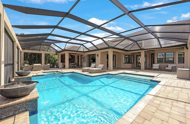 Luxurious 4-Bedroom Estate with TPC Golf Access in Treviso Bay – Seasonal Rental