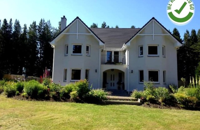 Luxury Scottish Highland Country House with large private gardens by Inverness