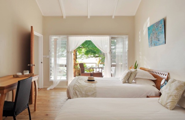 Luxury Two Bedroom Oceanfront Villa with two separate bathrooms and large front deck