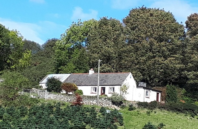 Maggie's Cottage is located on the side of a mountain, overlooking Dundalk Bay.