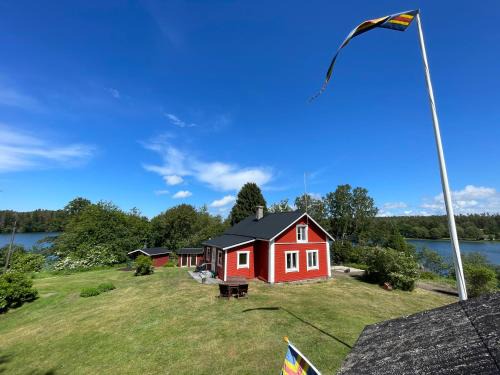 Majas Backe on a island with boat