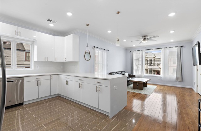 Massive 4-bedroom, 3-bathroom apartment with shared yard & bonus garage parking