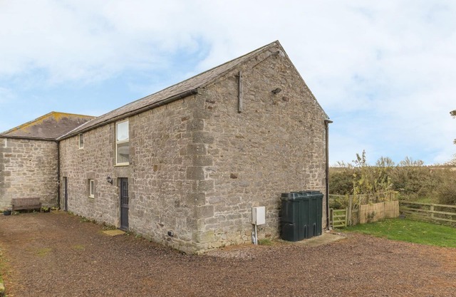 MILL HOUSE, pet friendly, with a garden in Lowick