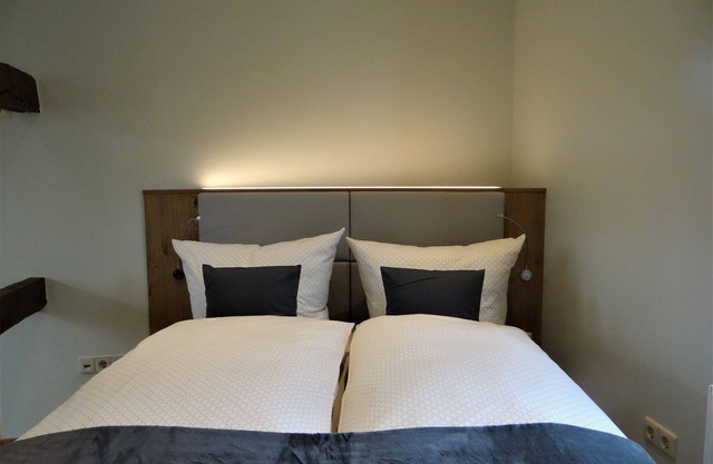 Modern 2-storey apartment in a listed half-timbered house on the market