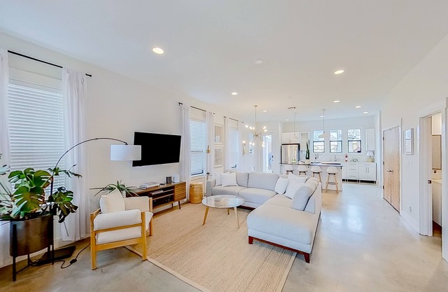 Modern 2-story dog-friendly condo with quaint patio, central AC & washer/dryer