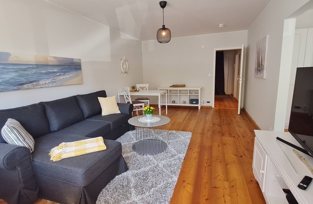 Modern city apartment with balcony and private parking space in a quiet location