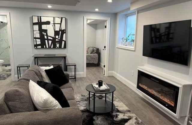 Modern, clean, bright two bedroom lower level look out duplex with large windows