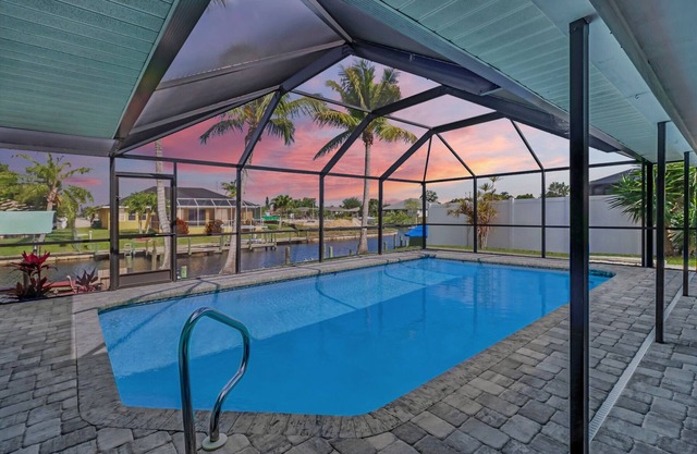 Modern Coastal Home w/Heated Pool & Waterfront Views!