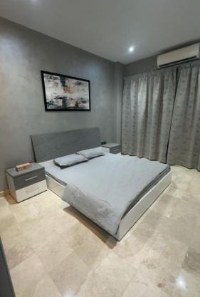 Modern Cozy Apartment with Elegant Gray Design & Smart Lighting