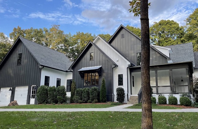 Modern farmhouse on 24 acres of trees with a heated pool