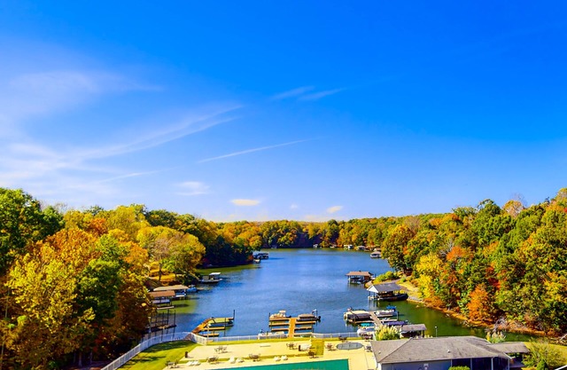 Modern lake-view condo with pool, children's pool, boat trailer storage & launch