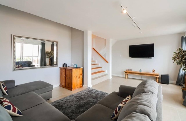 Modern Lakeside 3 Story Apartment situated on the Knysna Lagoon