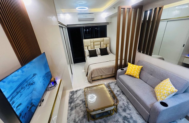 Modern Makati City Condo with Parking & Cityscape View Balcony