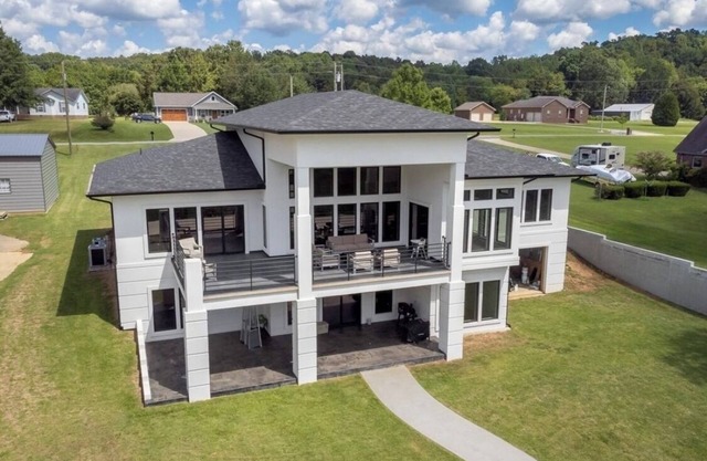 Modern Waterfront Mansion with Private Dock, kayak, paddle board and ping pong