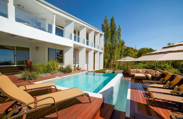 MtnTop Mansion! 5 Mins to Downtown, PRIVATE Theater, Hot Tub, Gym, Heated Pool