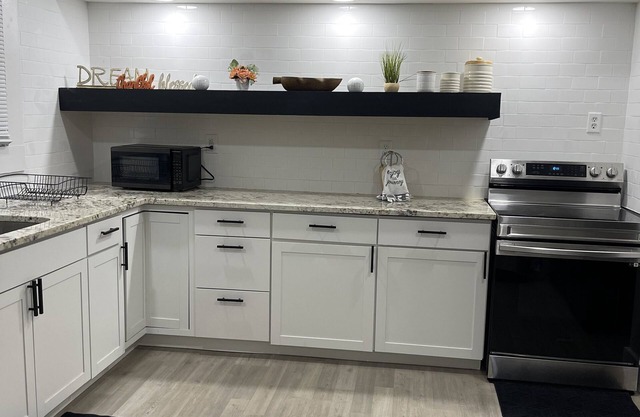 My home is a luxury 3 bedroom duplex sleeps up to 7 guest. WiFi is included .