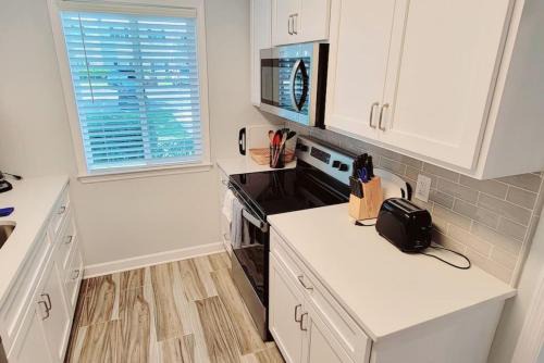 N1 UPGRADED comfortable and well maintained bedrooms upstairs large living room screened porch