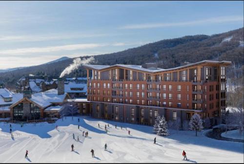 New luxury ski in ski out 4 bedroom at One At Spruce Peak By Stowe Mountain Rentals
