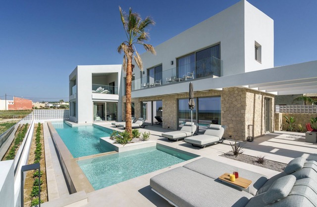Newly built Beachfront Villa with Heated Pool, Jacuzzi/Hot Tub and Playroom