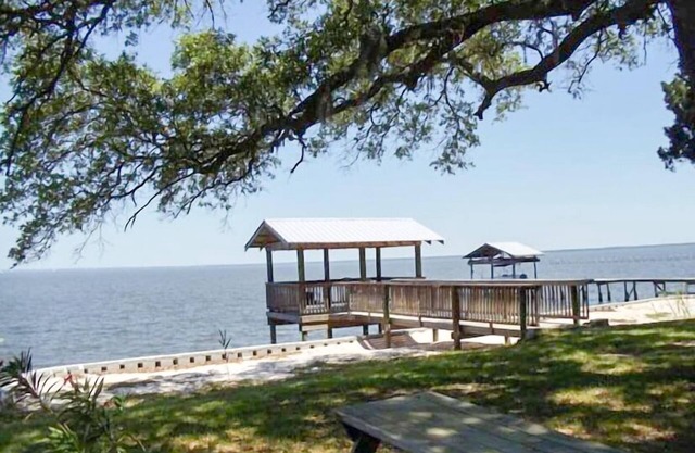 Newly updated, screened porches, dog friendly, fenced yard
