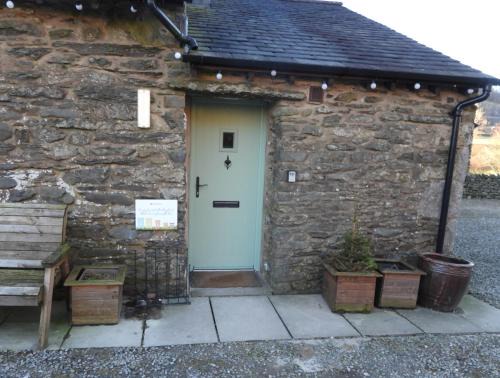 Oak Tree Cottage nestled in the hills of the Lake District and Yorkshire Dales