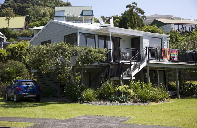 ONEMANA. Premium location. Walk across the road to the beach.
