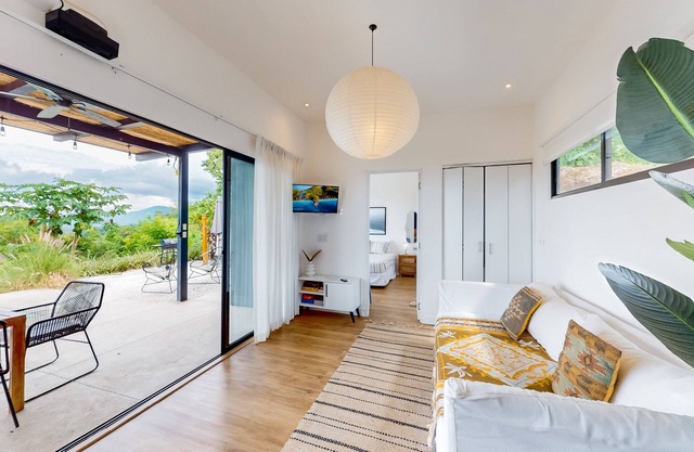 Opulent mountain oasis with private ocean-view infinity pool, terrace & hammocks