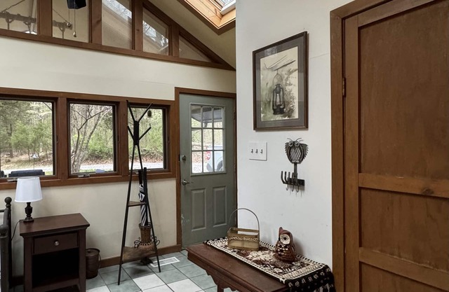 Owl's Nest is a perfect getaway in the woods with lakes nearby. Pet friendly!