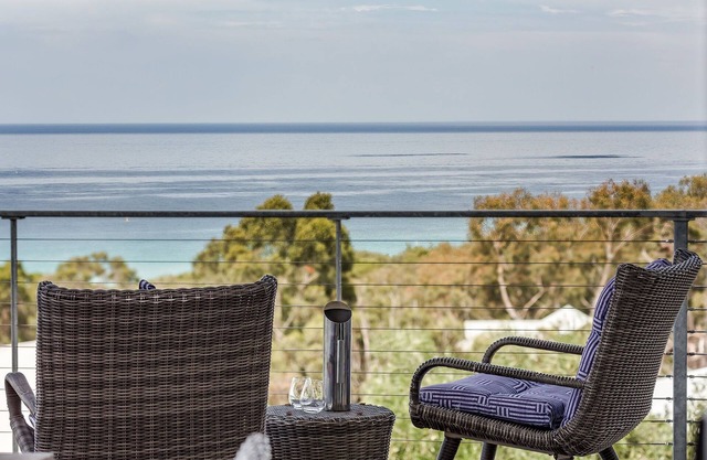 PANORAMIC VISTAS OF THE PRISTINE COASTLINE & TURQUOISE WATERS OF EAGLE BAY.