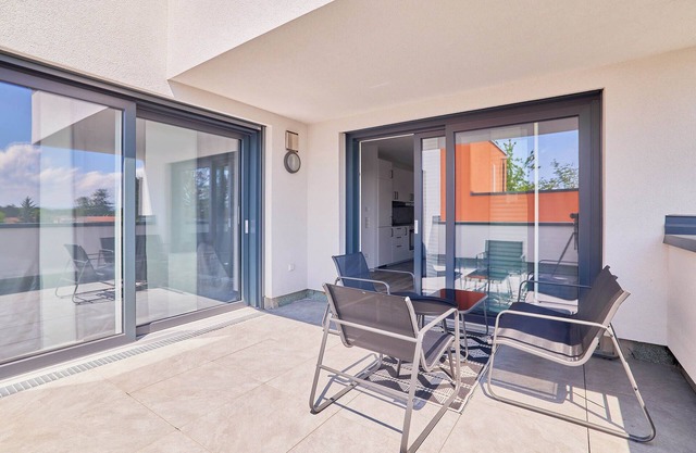 Penthouse apartment in new building with barbecue