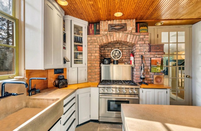 Picturesque Traditional home located on a private street, stunning pool,.