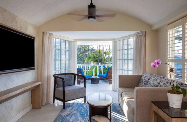 Pool View Suite w/Living Space and Balcony | Pets Are Allowed | Beach Access
