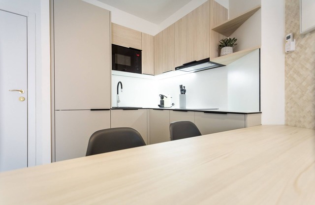 Precioso Apartamento con Patio y Parking Gratis