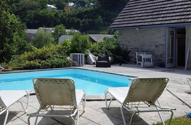 Pretty house with swimming pool in wooded grounds overlooking the Pic du Montaigu.
