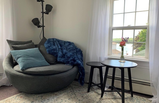 Private, cozy, furnished second floor studio in historic district with sea views