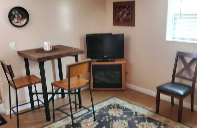 Private entrance to this cozy first floor apartment in house. Close to transit