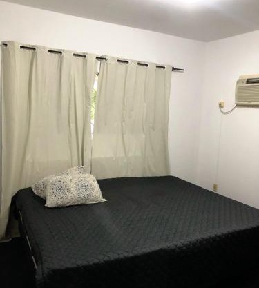 Quarto econômico 50 metros da praia