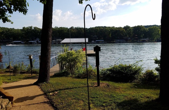 Quiet location, beautiful lakefront home in a cove. Private covered boat dock!n