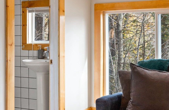 Rarely offered 2 waterfront cottages with 2 hot tubs side by side!