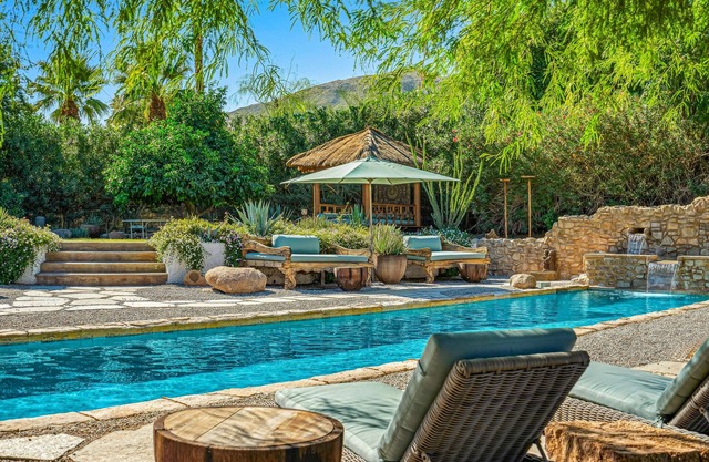 Rejuvenating retreat with pool, artistic finishes, & mtn views - dog-friendly