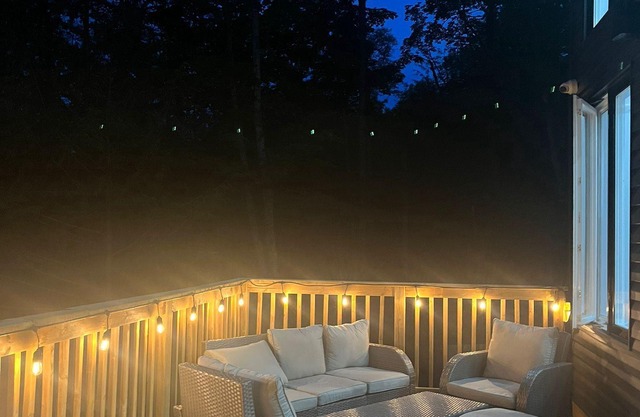 Relax with the family on the lake front with modern living in natural wilderness
