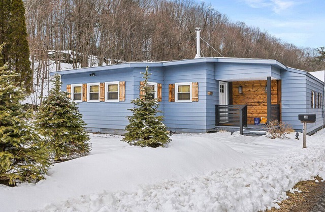 Renovated home, set on three-acre lot, surrounded by serene forest,...